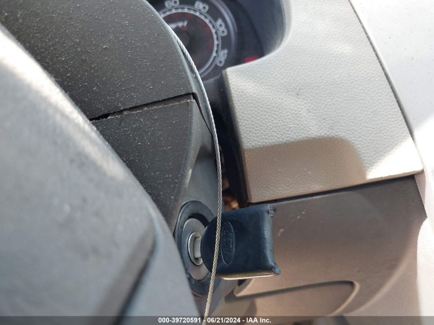 2009 Ford Focus S VIN: 1FAHP34N79W211377 Lot: 39720591