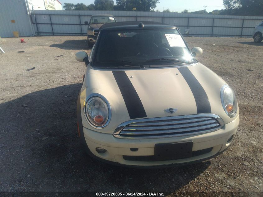 2010 Mini Cooper VIN: WMWMR3C55ATU977H5 Lot: 39720595