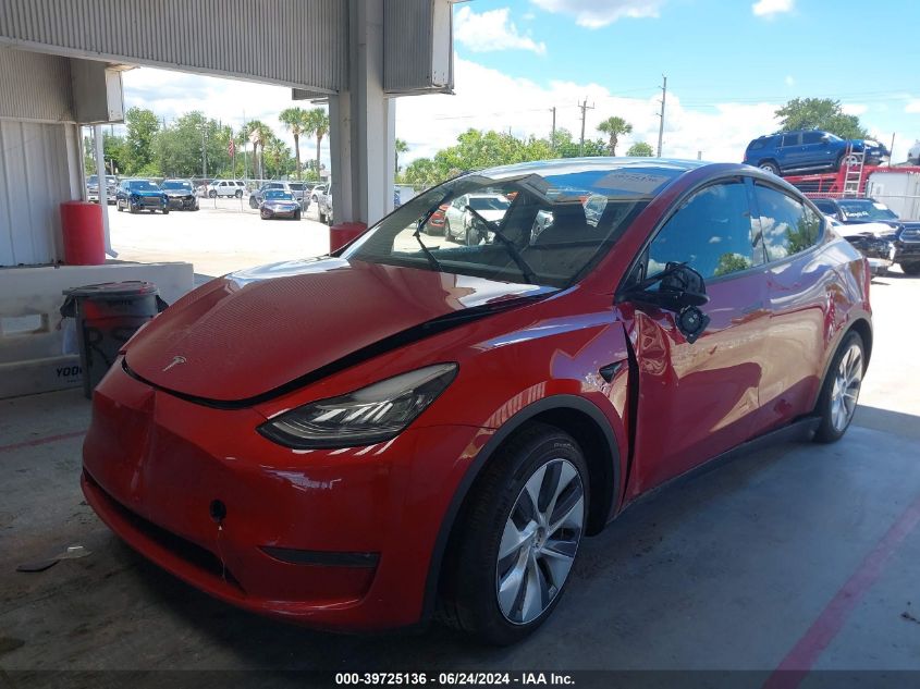 2023 Tesla Model Y Awd/Long Range Dual Motor All-Wheel Drive VIN: 7SAYGDEE6PA080863 Lot: 39725136