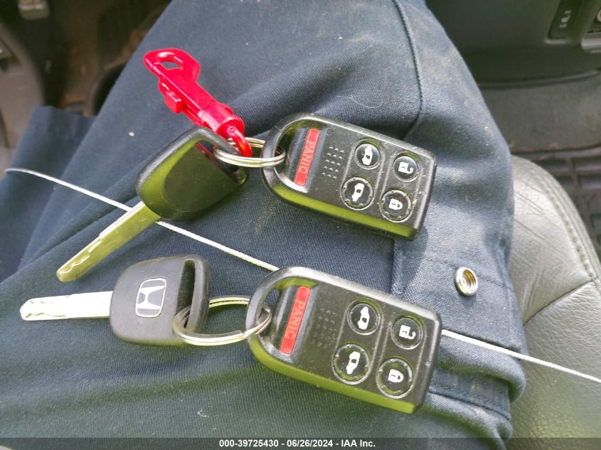 2007 Honda Odyssey Ex-L VIN: 5FNRL38677B438910 Lot: 39725430