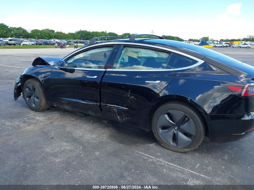 2019 Tesla Model 3 VIN: 5YJ3E1EA1KF410493 Lot: 39725508