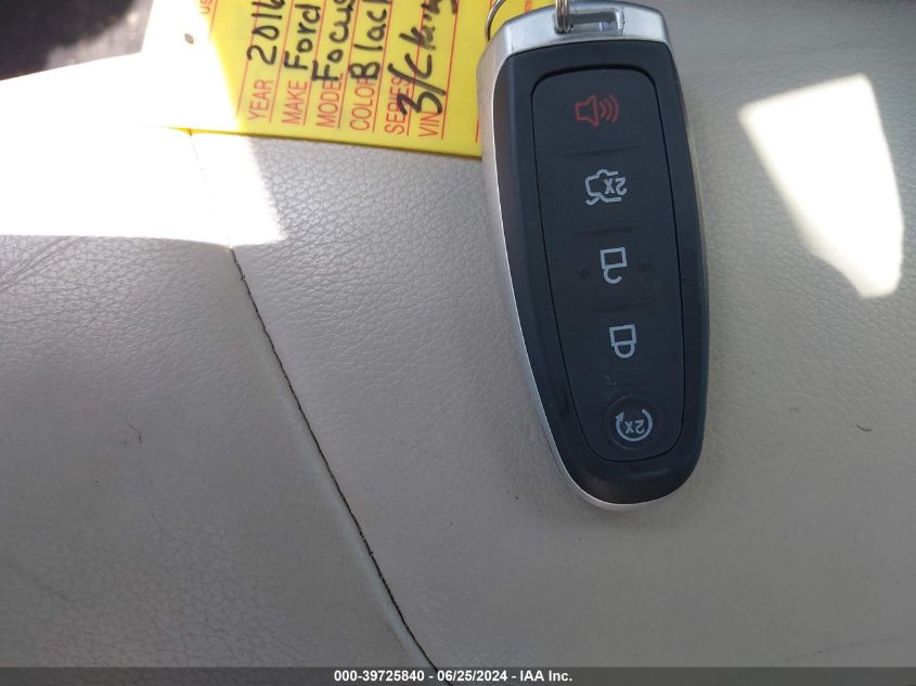 2016 Ford Focus Titanium VIN: 1FADP3N28GL332615 Lot: 39725840