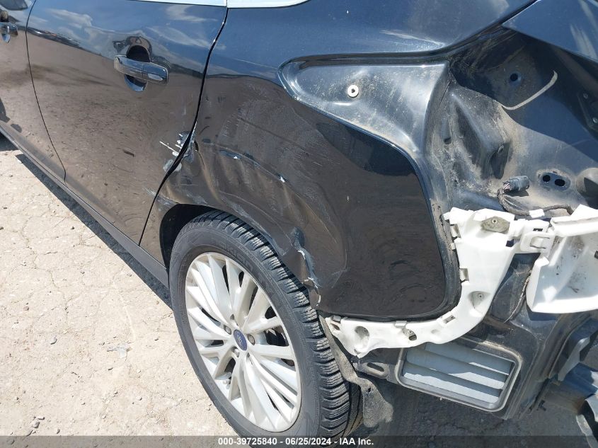 2016 Ford Focus Titanium VIN: 1FADP3N28GL332615 Lot: 39725840