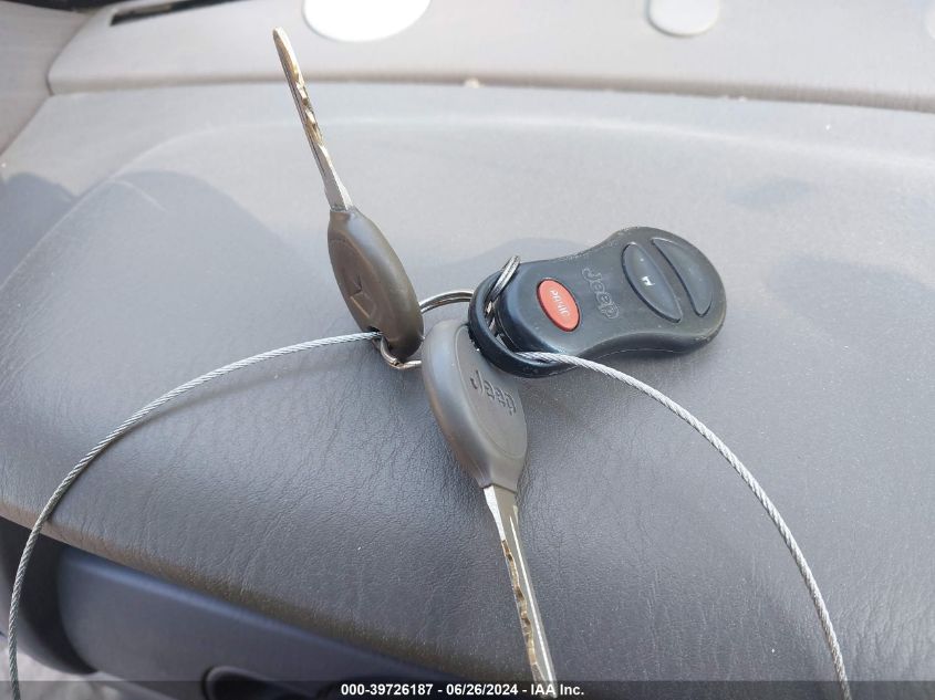 2000 Jeep Grand Cherokee Laredo VIN: 1J4GW48S5YC180638 Lot: 39726187