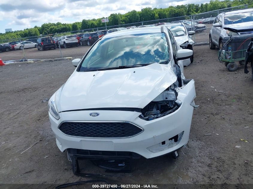 2018 Ford Focus Se VIN: 1FADP3F23JL206524 Lot: 39727450