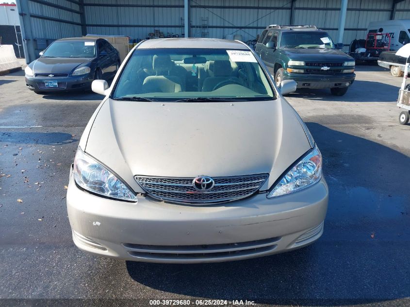 2003 Toyota Camry Le VIN: 4T1BE30K33U711679 Lot: 39729680