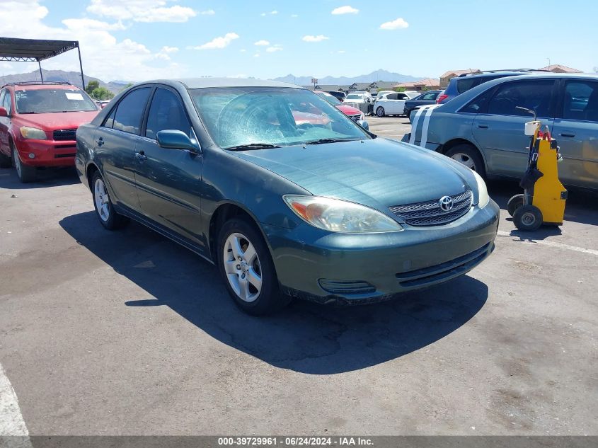 2003 Toyota Camry Le VIN: JTDBE32K530160275 Lot: 39729961