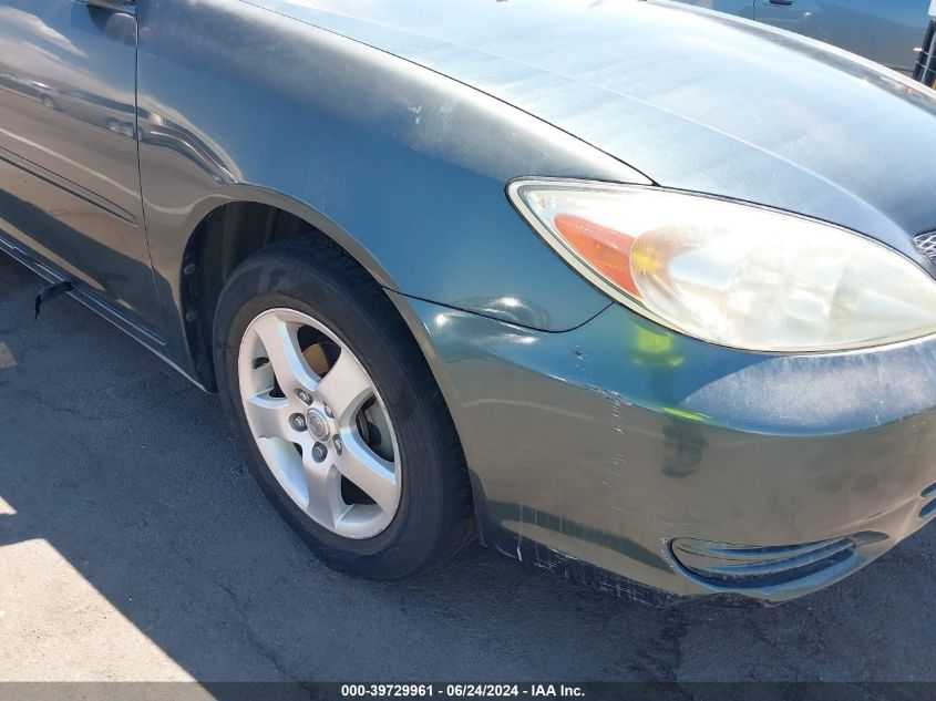 2003 Toyota Camry Le VIN: JTDBE32K530160275 Lot: 39729961