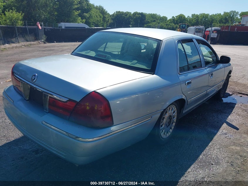 2003 Mercury Grand Marquis Gs VIN: 2MEFM74W13X703083 Lot: 39730712