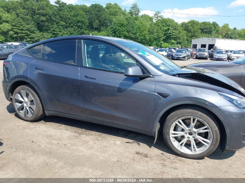 2023 Tesla Model Y Awd/Long Range Dual Motor All-Wheel Drive VIN: 7SAYGDEE5PF668000 Lot: 39733204