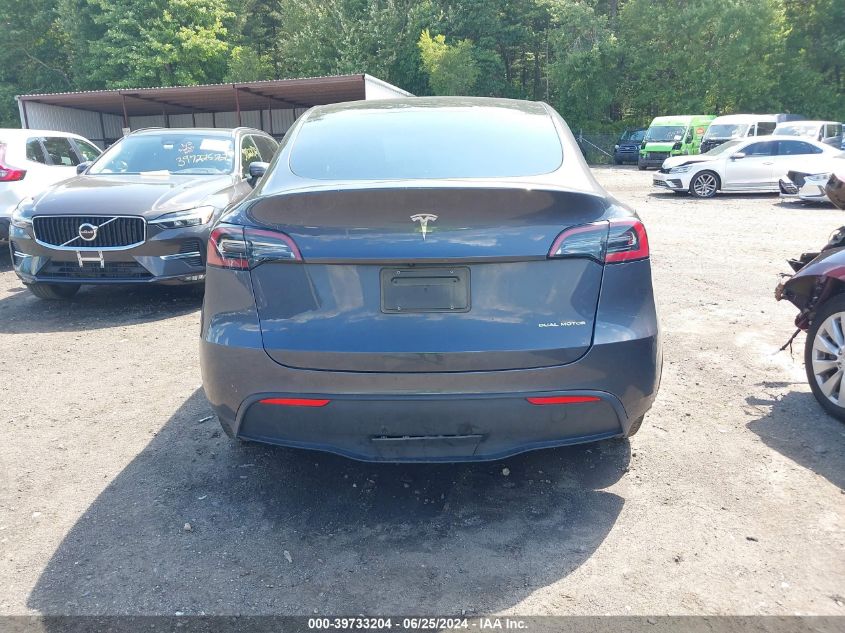 2023 Tesla Model Y Awd/Long Range Dual Motor All-Wheel Drive VIN: 7SAYGDEE5PF668000 Lot: 39733204