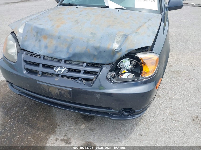 2005 Hyundai Accent Gls VIN: KMHCG45C75U665587 Lot: 39733728