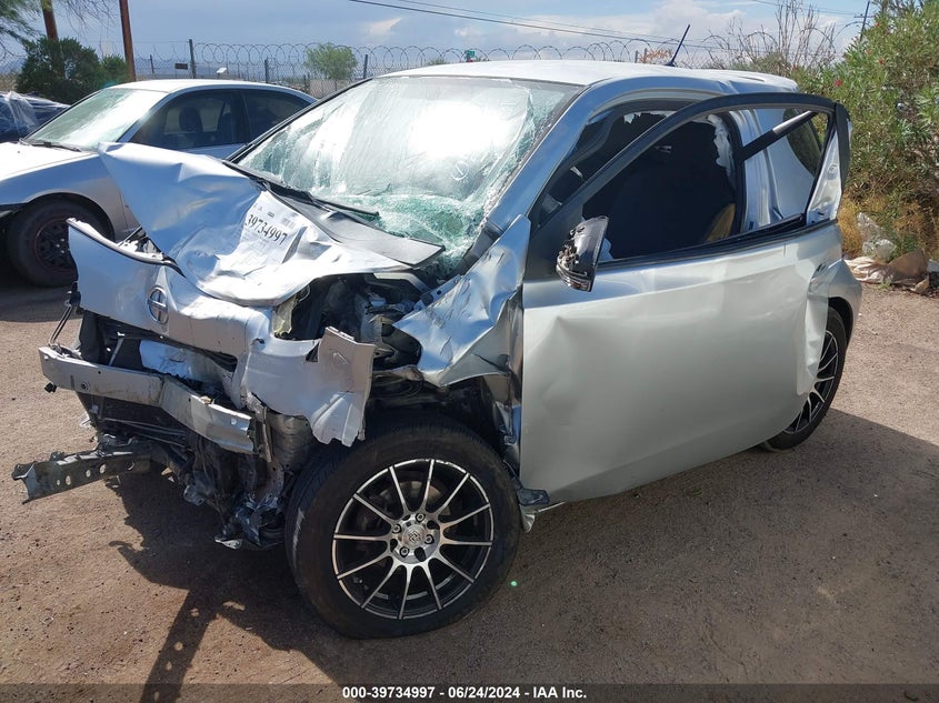 2012 Scion Iq VIN: JTNJJXB0XCJ021861 Lot: 39734997
