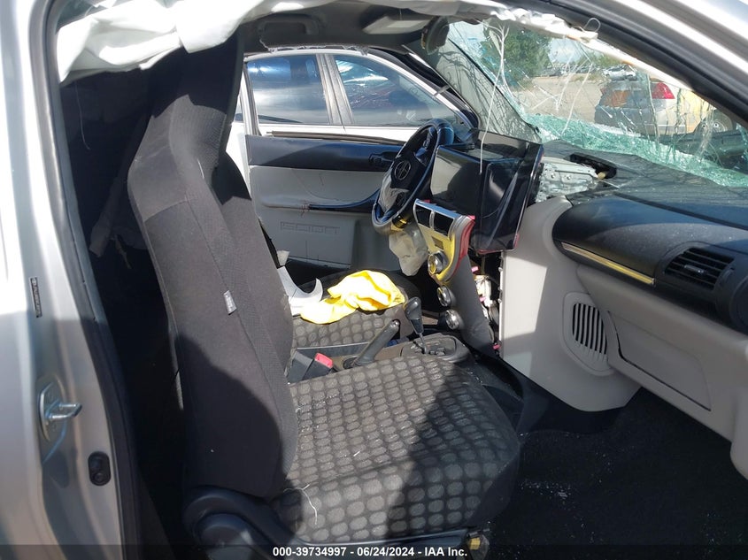 2012 Scion Iq VIN: JTNJJXB0XCJ021861 Lot: 39734997