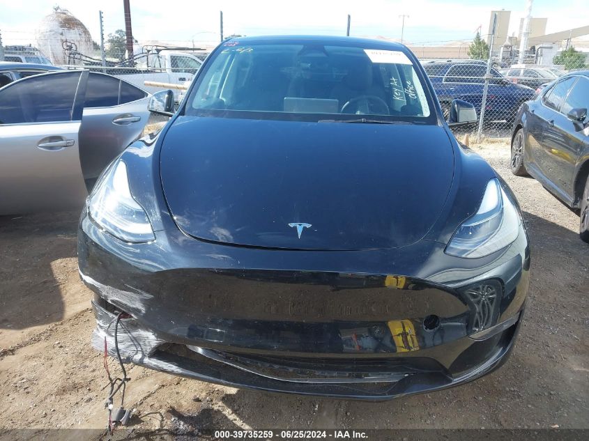 2023 Tesla Model Y Awd/Long Range Dual Motor All-Wheel Drive VIN: 7SAYGDEEXPF924891 Lot: 39735259