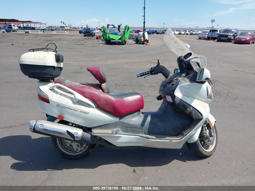 2011 Suzuki An650 A VIN: JS1CP51B8B2100399 Lot: 39736108