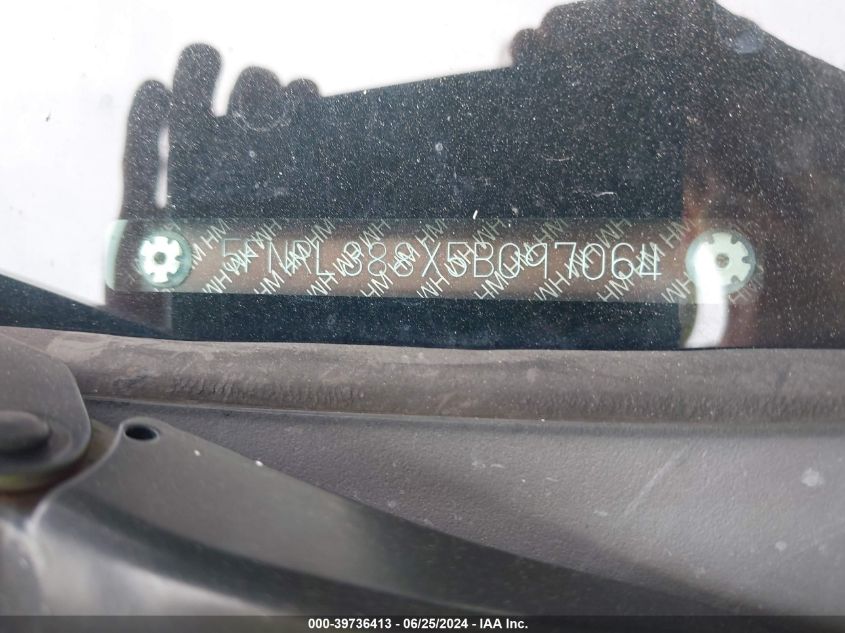 2005 Honda Odyssey Touring VIN: 5FNRL388X5B097064 Lot: 39736413