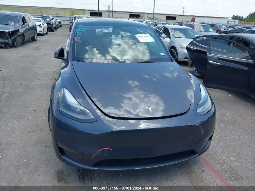 2023 Tesla Model Y VIN: 7SAYGDEE1PF886984 Lot: 39737156