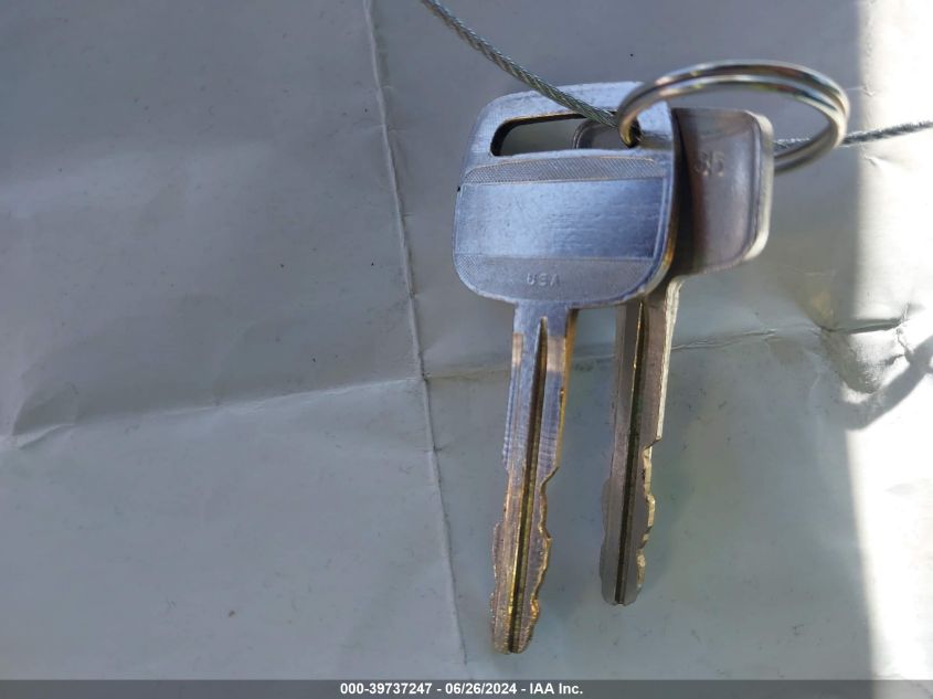 1999 Toyota Sienna Le VIN: 4T3ZF13C7XU107070 Lot: 39737247