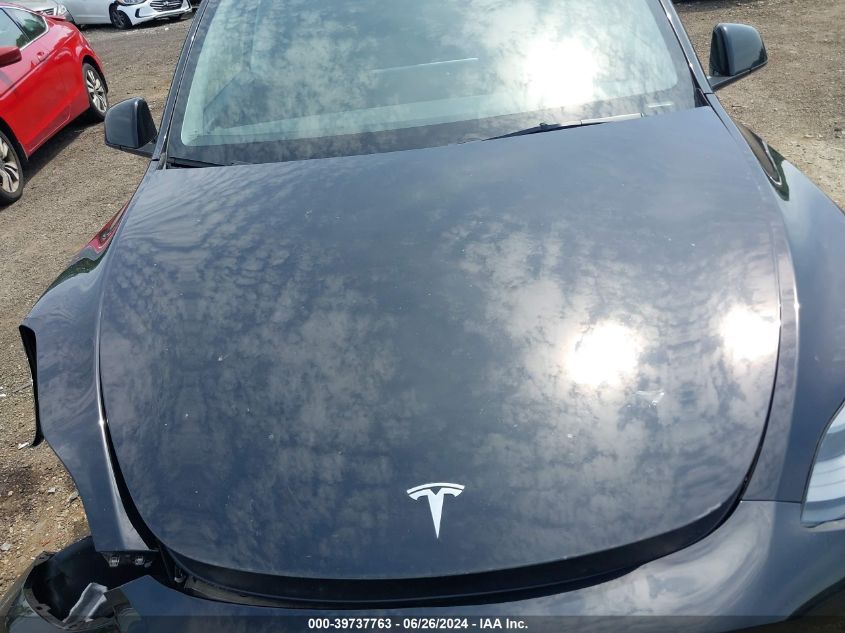 2023 Tesla Model Y Awd/Long Range Dual Motor All-Wheel Drive VIN: 7SAYGAEE2PF753942 Lot: 39737763