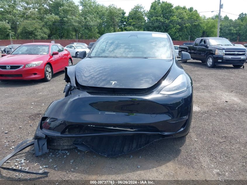 2023 Tesla Model Y Awd/Long Range Dual Motor All-Wheel Drive VIN: 7SAYGAEE2PF753942 Lot: 39737763