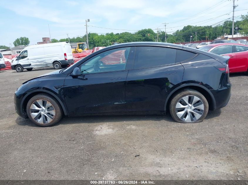 2023 Tesla Model Y Awd/Long Range Dual Motor All-Wheel Drive VIN: 7SAYGAEE2PF753942 Lot: 39737763