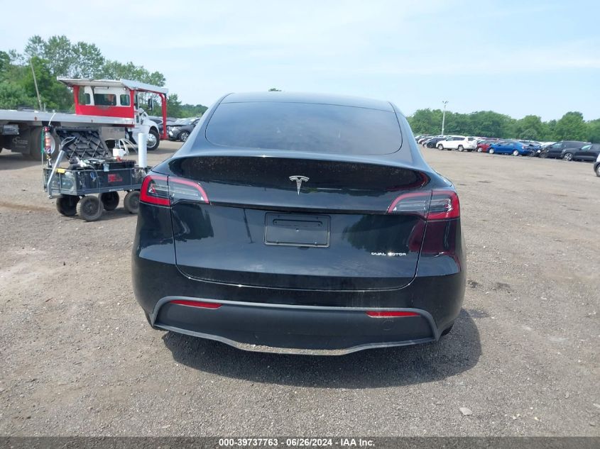 2023 Tesla Model Y Awd/Long Range Dual Motor All-Wheel Drive VIN: 7SAYGAEE2PF753942 Lot: 39737763