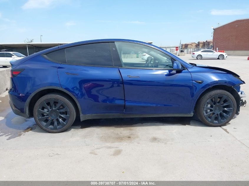 2023 Tesla Model Y Awd/Long Range Dual Motor All-Wheel Drive VIN: 7SAYGDEE9PA148864 Lot: 39738707