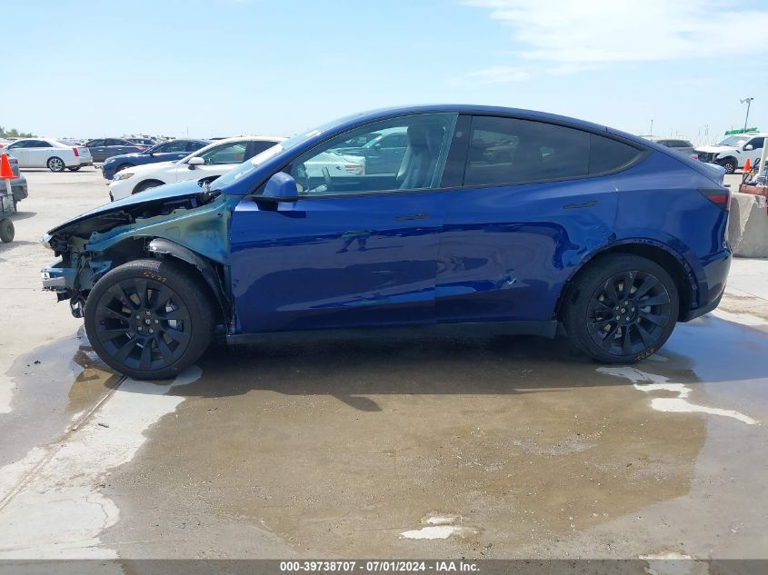 2023 Tesla Model Y Awd/Long Range Dual Motor All-Wheel Drive VIN: 7SAYGDEE9PA148864 Lot: 39738707