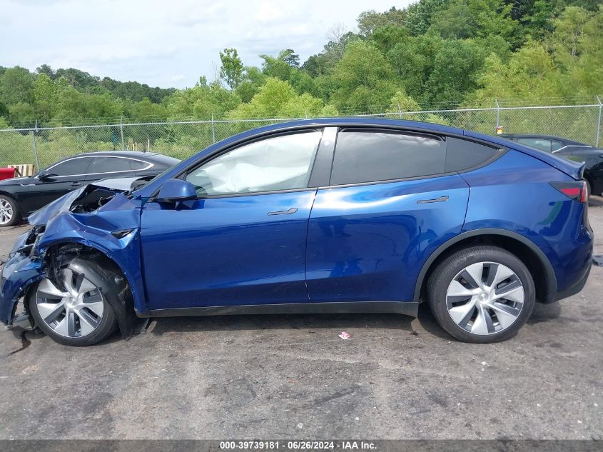 2023 Tesla Model Y Awd/Long Range Dual Motor All-Wheel Drive VIN: 7SAYGDEE0PA174902 Lot: 39739181