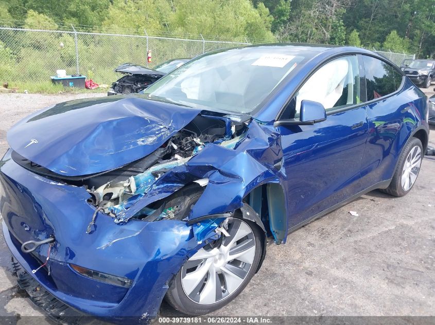 2023 Tesla Model Y Awd/Long Range Dual Motor All-Wheel Drive VIN: 7SAYGDEE0PA174902 Lot: 39739181