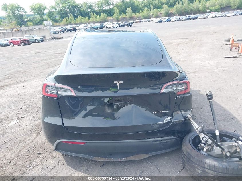 2023 Tesla Model Y VIN: 7SAYGDEE1PA184256 Lot: 39739754