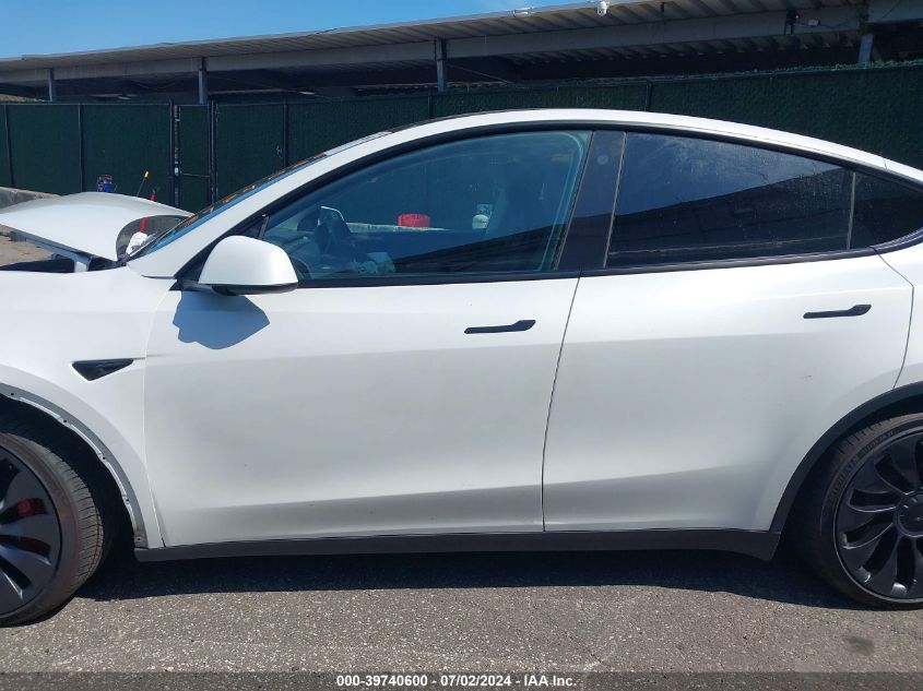 2023 Tesla Model Y Awd/Performance Dual Motor All-Wheel Drive VIN: 7SAYGDEF9PF773938 Lot: 39740600