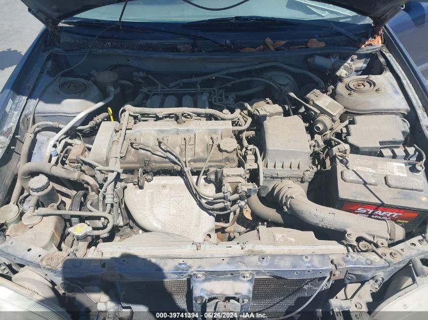 1999 Mazda 626 Es/Lx VIN: 1YVGF22C4X5886055 Lot: 39741394