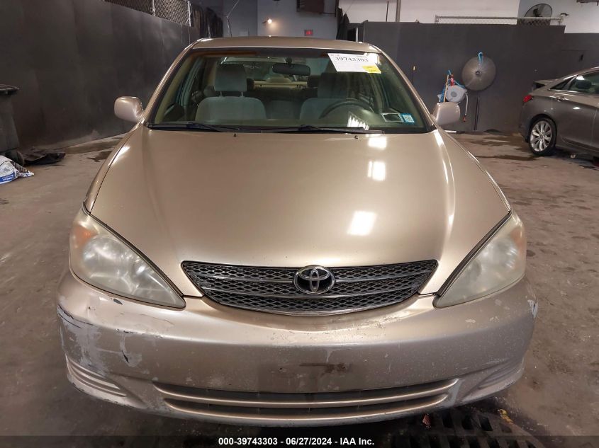 2003 Toyota Camry Le VIN: 4T1BE32K13U671132 Lot: 39743303