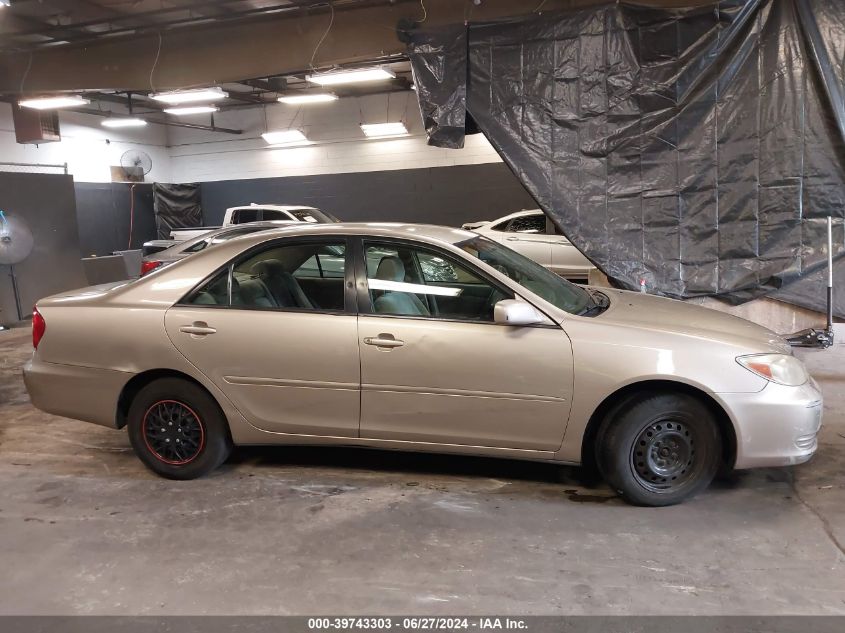 2003 Toyota Camry Le VIN: 4T1BE32K13U671132 Lot: 39743303