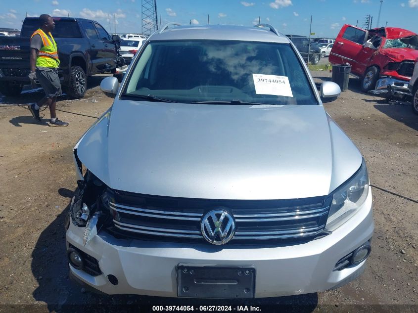 2014 Volkswagen Tiguan Se VIN: WVGBV3AX2EW606813 Lot: 39744054