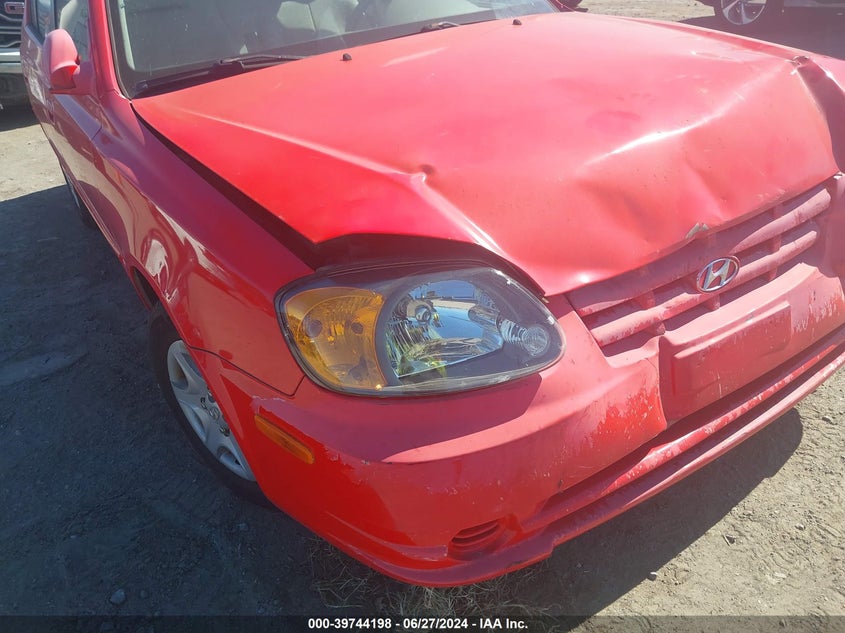 2005 Hyundai Accent Gl VIN: KMHCG45C55U673302 Lot: 39744198
