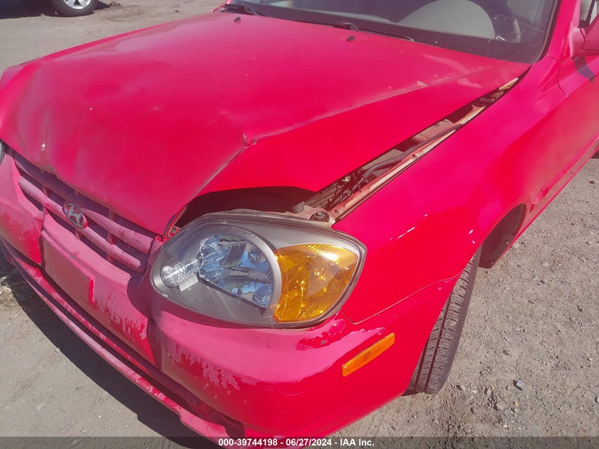 2005 Hyundai Accent Gl VIN: KMHCG45C55U673302 Lot: 39744198