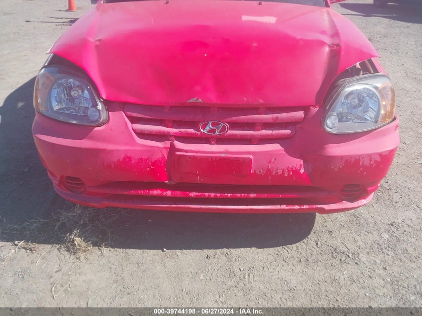 2005 Hyundai Accent Gl VIN: KMHCG45C55U673302 Lot: 39744198