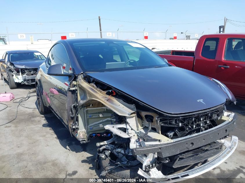 2023 Tesla Model Y Awd/Performance Dual Motor All-Wheel Drive VIN: 7SAYGDEF0PF902388 Lot: 39745401