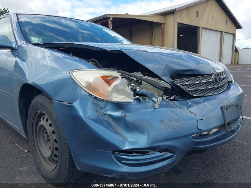 2003 Toyota Camry Le VIN: JTDBE32K830141638 Lot: 39746867