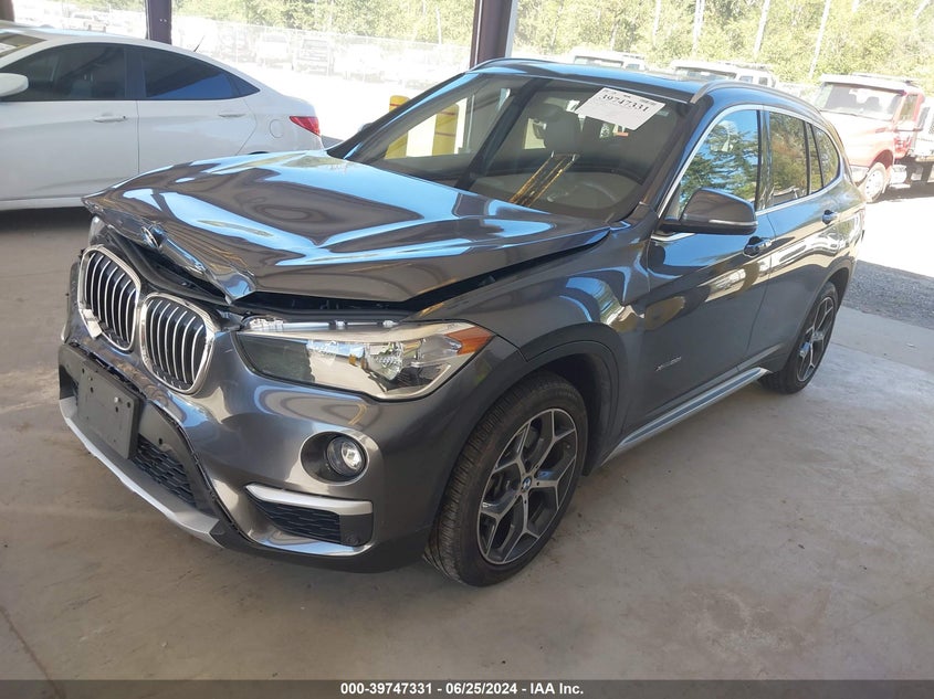 2018 BMW X1 xDrive28I VIN: WBXHT3C34J5K25627 Lot: 39747331