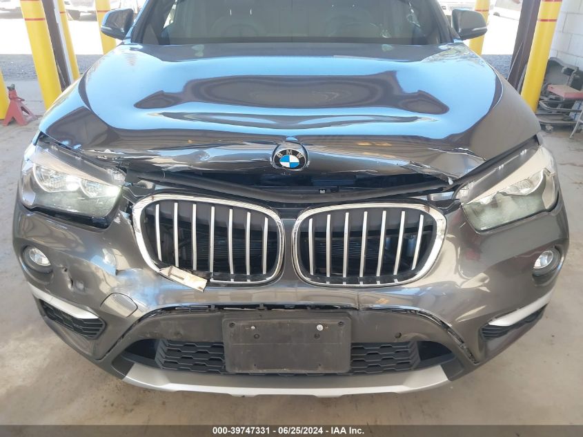 2018 BMW X1 xDrive28I VIN: WBXHT3C34J5K25627 Lot: 39747331