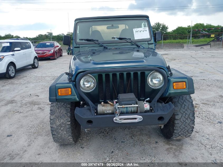 2002 Jeep Wrangler / Tj Sport VIN: 1J4FA49S42P735944 Lot: 39747479