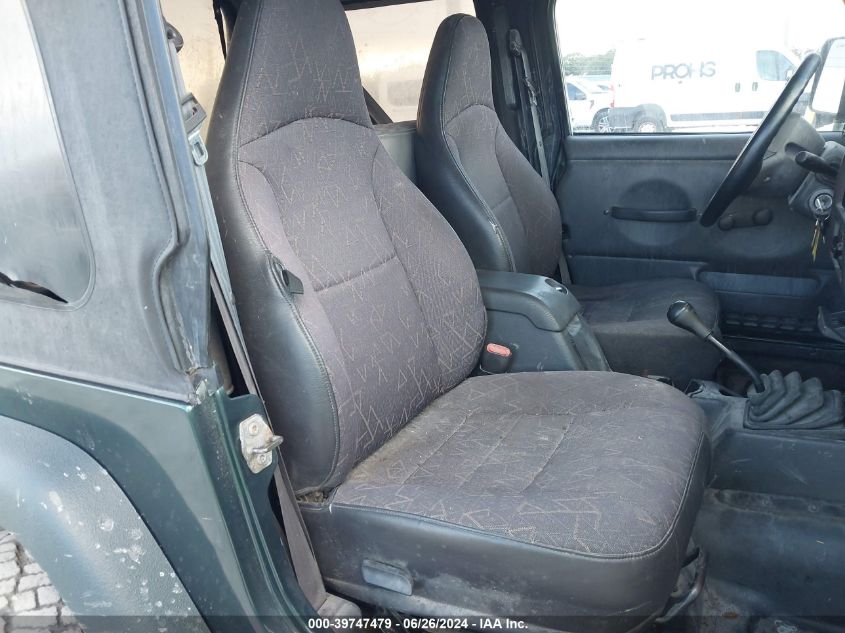 2002 Jeep Wrangler / Tj Sport VIN: 1J4FA49S42P735944 Lot: 39747479