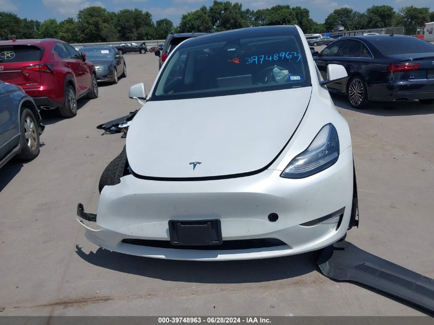 2023 Tesla Model Y VIN: 7SAYGDEE5PA076271 Lot: 39748963