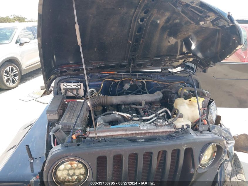 2002 Jeep Wrangler Sport VIN: 1J4FA49S62P771280 Lot: 39750795