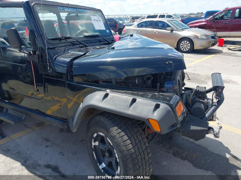 2002 Jeep Wrangler Sport VIN: 1J4FA49S62P771280 Lot: 39750795