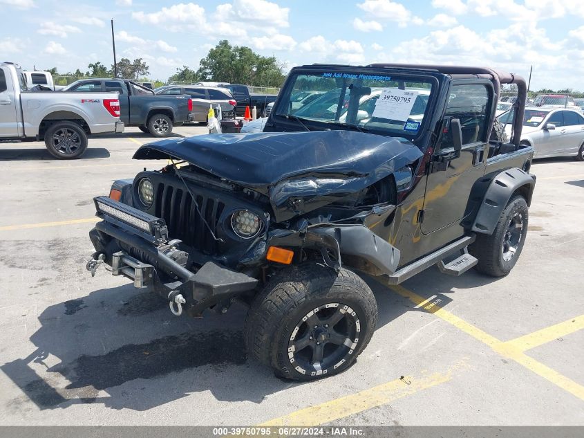 2002 Jeep Wrangler Sport VIN: 1J4FA49S62P771280 Lot: 39750795